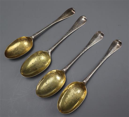 Three George I Britannia standard silver rat tail spoons, DA, London, 1714 and one other later silver spoon.